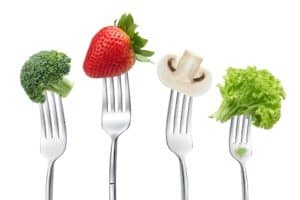 Fruit and vegetables on forks