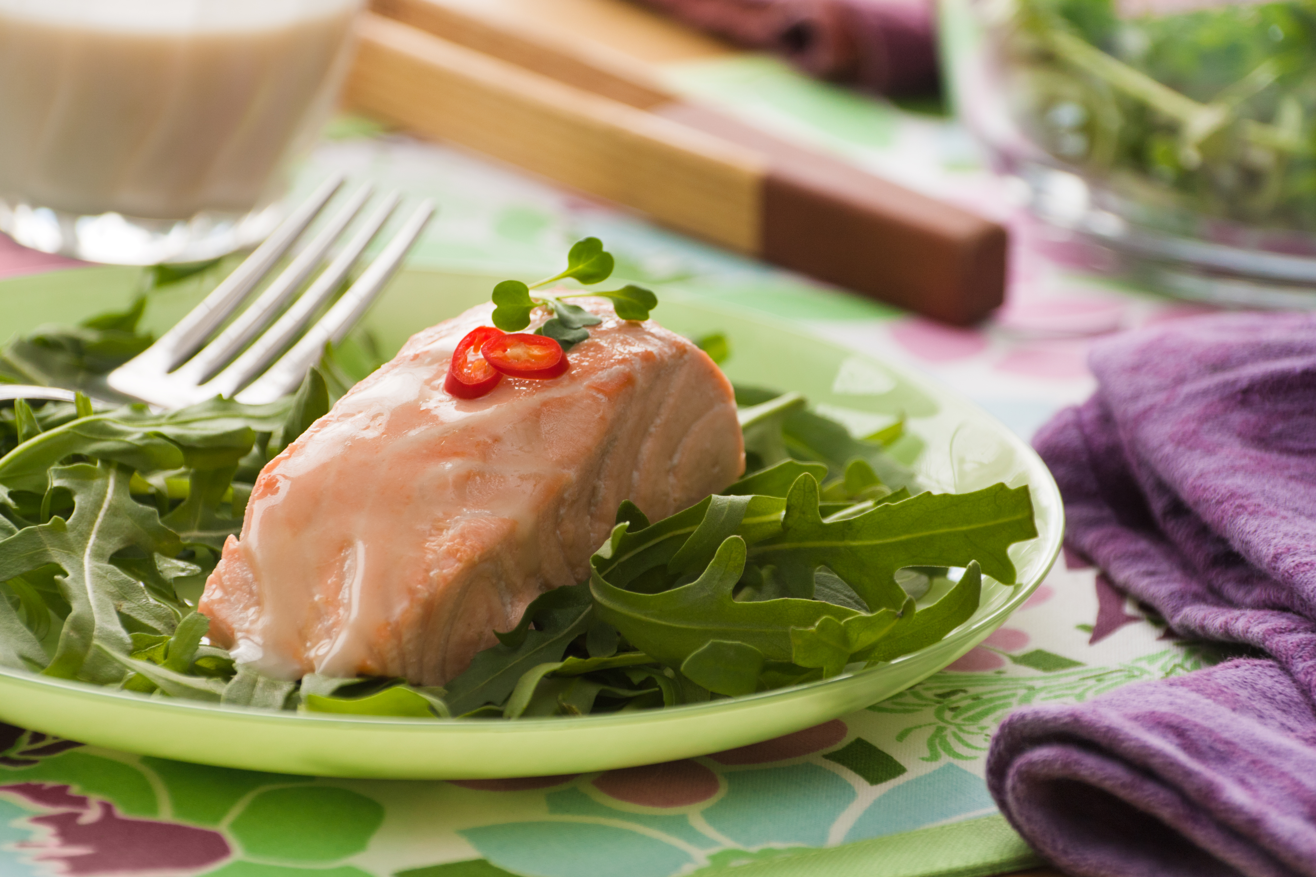 Poached Coconut Salmon Over Greens