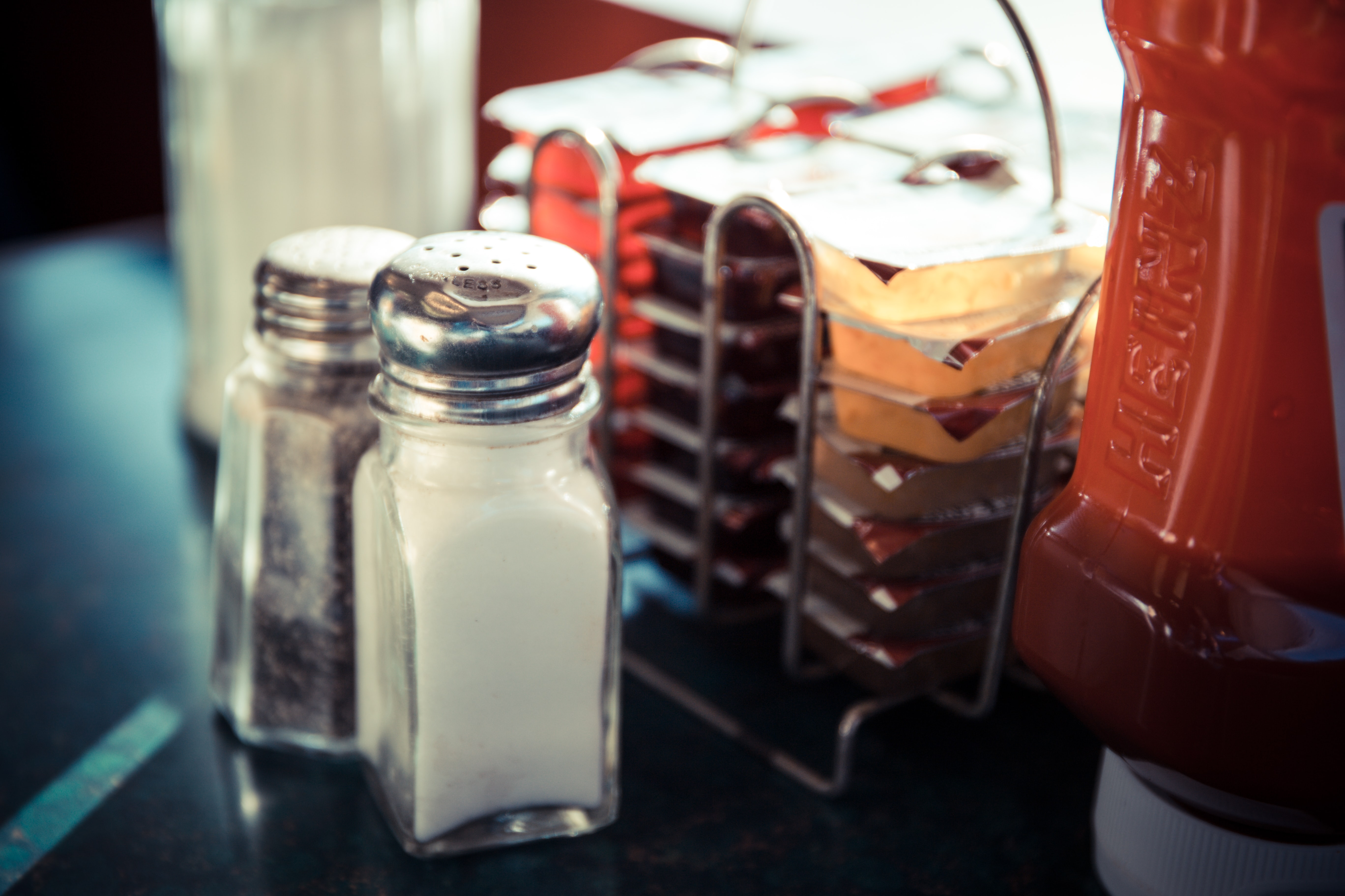 The Reason Some Fancy Restaurants Don't Have Salt And Pepper Shakers