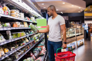 man shopping at supermarket